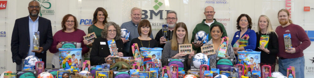 BMI FCU employees with toy donations
