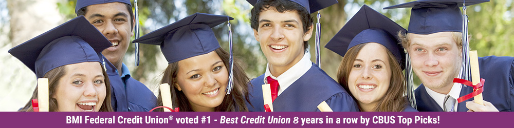 graduates posing for picture