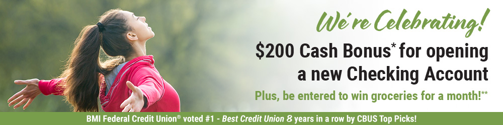 woman with arms stretched out in nature