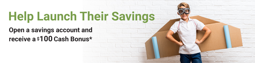 children on the floor writing in notepads