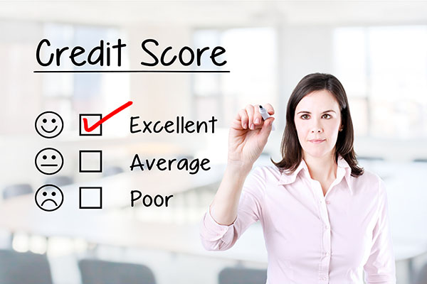 lady writing her credit score on a board